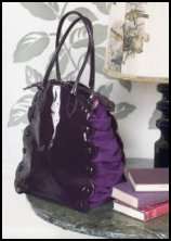 Plumo purple patent and suede handbag