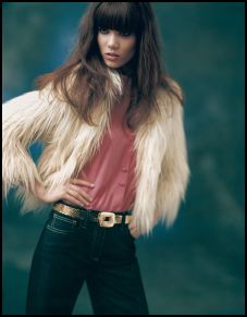 Topshop - Cream cropped Shearling jacket, £65/96, sherbet pink frill blouse £28/40, Indigo wide leg Mel jean £40/60, Gold snake effect metal belt £30/45. 