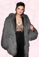 Pixie Geldof wearing a dyed Mongolian fur chubby coat. 
