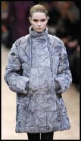 Akris catwalk coat with kangaroo pockets.