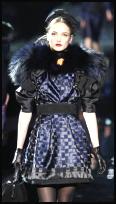 D&G opulent fabric lampshade skirt with well defined shoulders - fuller puff sleeves.