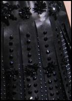 Detail of stud decoration on Prada Roman legion dress - Autumn 2009 Fashion on fashion-era.com.