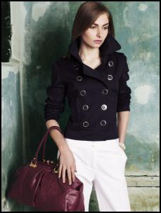 Double breasted navy jacket �15, F&F white high waisted trousers �15, F&F black lock frame bag �15. All from Spring Summer 2009 F&F Womenswear at Tesco.