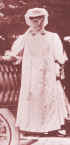 Picture of a lady in motoring dress alighting from a car. Costume 