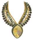 Rows of shaped wood, blacklip, citrine, African turquoise and many more semi-precious stones make this fantastic Palwan necklace.