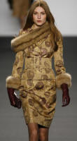 Blass - Sable cuffs and circle fur wrap on a gold brocade suit