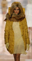 BLUGIRL- Yellow silk parka with fox trim.
