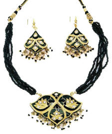 Necklace collars and pendants  from west Rajasthan. This has been made maade made using the traditional Indian lac jewellery technique.