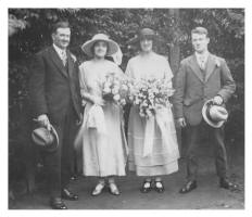 1921 Wedding photograph of bride, husband , bridesmaid and best man. and Family