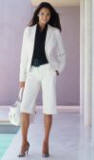 Image courtesy of NEXT UK Ecru cotton jacket �59.99, Ecru cotton shorts �26.99, Black stretch shirt �26.99, Metallic lattice shoes �39.99.