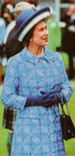 A coat and hat outfit of the type the Quuen has made her own look