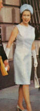 The Queen wearing a slimline shift and showing off a great figure.