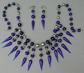 Fashion-era picture of costume jewellery blue glass bead pieces from Glitterbug