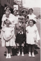 Picture of Whitsunday Family and Friends Group. Costume history and fashion history 1950s.