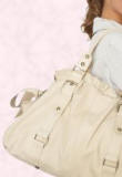 Cream Leather Tie Side Bag right is from River Island and costs �100/�168.