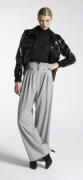  New Look Autumn/Winter 07/08 Collection - Womenswear Collection - Patent bomber �40/58�, Grey high waisted trousers �28/40, Black polo neck �20/29�, Black socks �2.50/3.50�, Black shoes �25/36�.