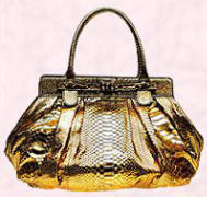 Zagliani materials are silicon injection treated and this lovely gold crocodile handbag retails at approx £1500.  