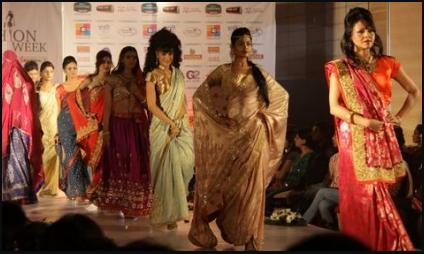 Vibrant Fashion Week Red and Gold Indian Saris