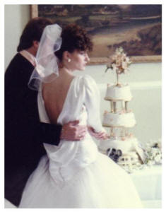 1986 - Backless wedding gown - cutting the cake.