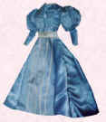 Fashion history and costume history doll in blue satin.