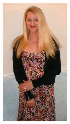 Pauline Weston Thomas wearing 18" Clip-in Hair Extensions without trimming - hair spread