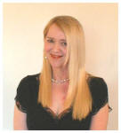 Pauline Thomas in 18" clip in human hair extensions after trimming and styling.