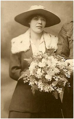 1919 bride wearing a suit.