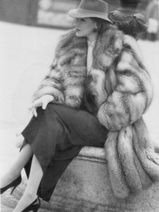 80s fashion hat and fur coat