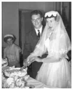 1950s wedding picture cutting cake