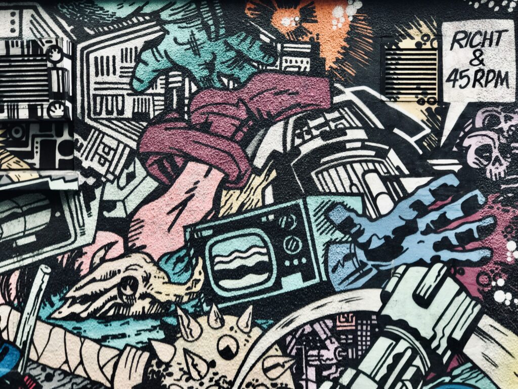 Detailed street art mural featuring colourful graphic illustrations and urban imagery